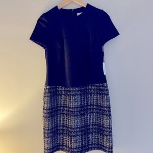 Calvin Klein. The perfect dress. Black classic with a plaid bottom.